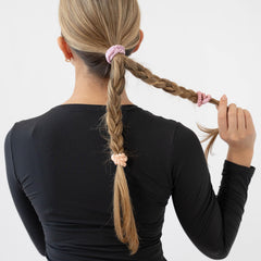 L. Erickson braided-polyester band closeup shows durable elastic core for secure styles.