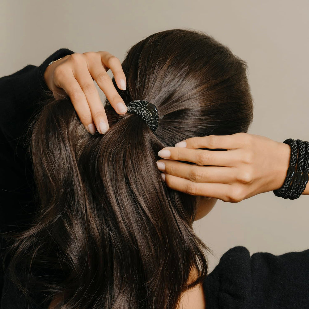 L. Erickson Grab & Go ponytail holders worn on ponytail demonstrate secure, slip-free fit.