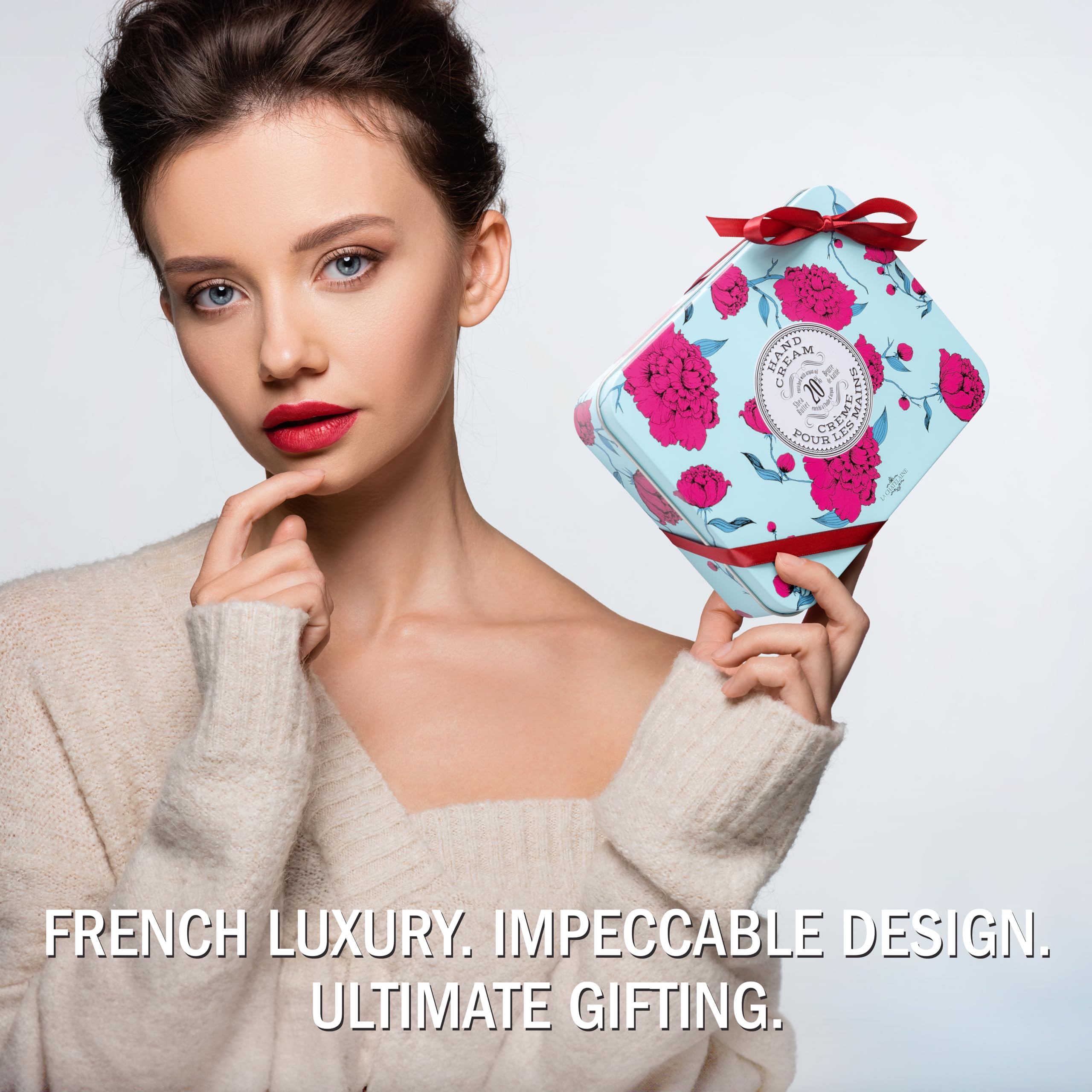 La Chatelaine lychee cranberry fragrance image suggests uplifting scent for pampering rituals.
