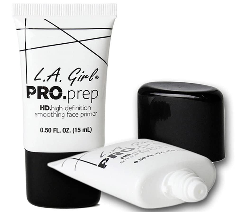 L.A. Girl bottle cap and dose closeup highlights precise application.