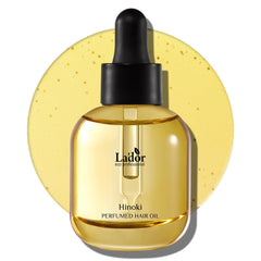LA'DOR hair perfume oil bottle shows glossy finish for polished waves.