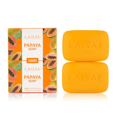 LAISAE papaya exfoliating soap bar closeup shows brightening formula for even tone.
