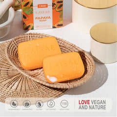 LAISAE papaya exfoliating soap bar lather demonstrates gentle exfoliation with jojoba oil.
