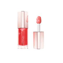 Lancôme Lip Idôle JuicyTreat gloss application close-up showing contouring and shine