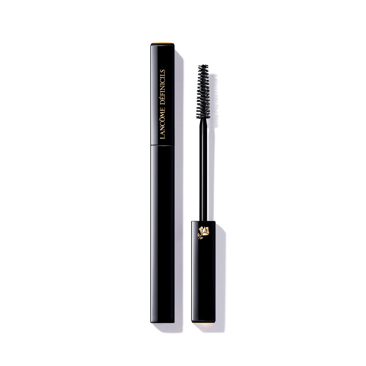 Lancôme Definicils mascara bottle shows sleek design for natural-length definition.