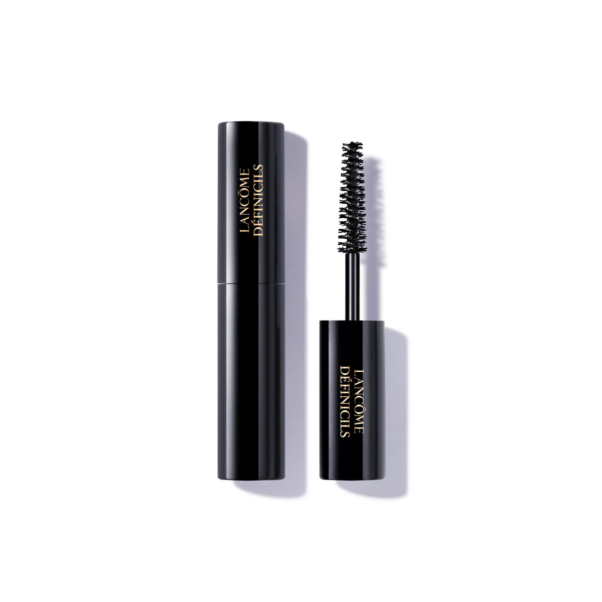 Lancôme Définicils travel-size packaging for on-the-go definition.