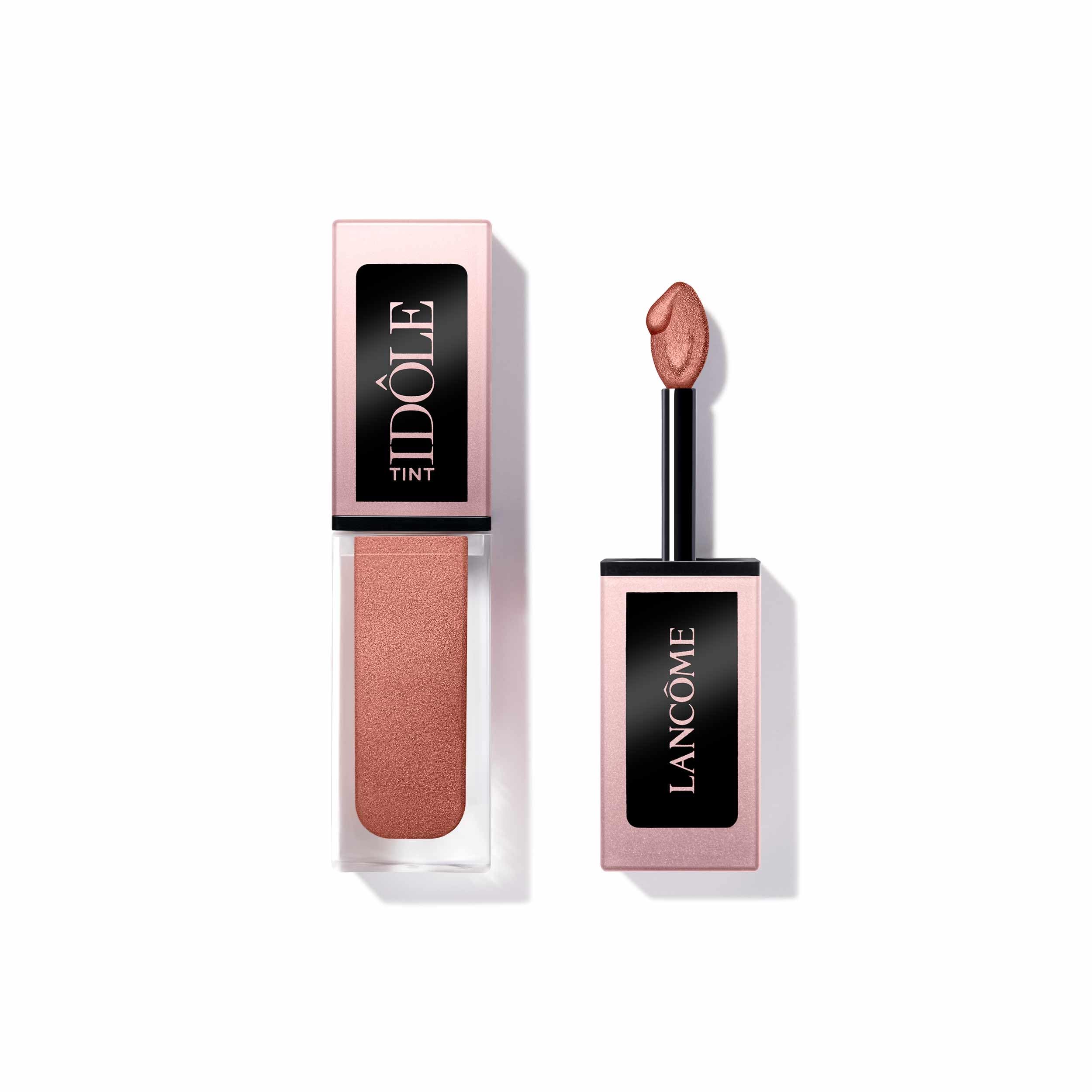 Lancôme Idôle Tint bottle open showing warm copper shimmer for long-lasting eye color.