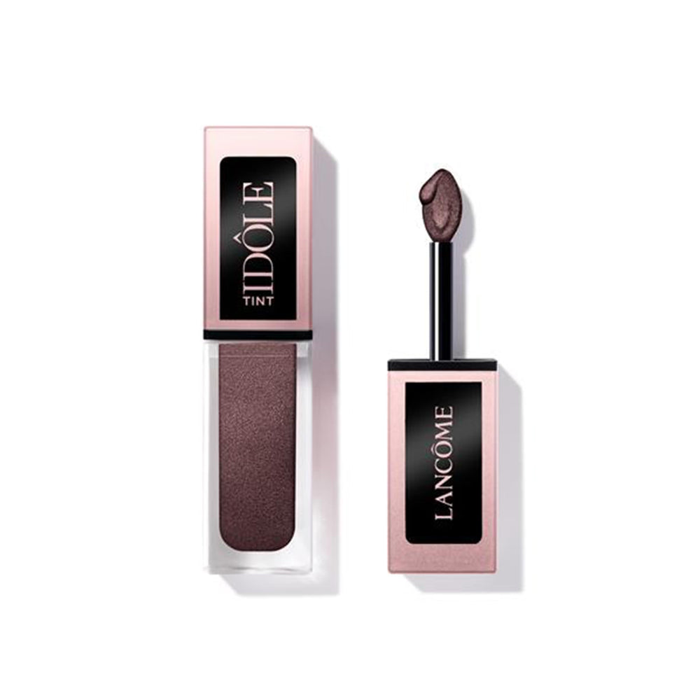 Lancôme Idôle Tint long-wear liquid eyeshadow flat-side applicator for easy blending.