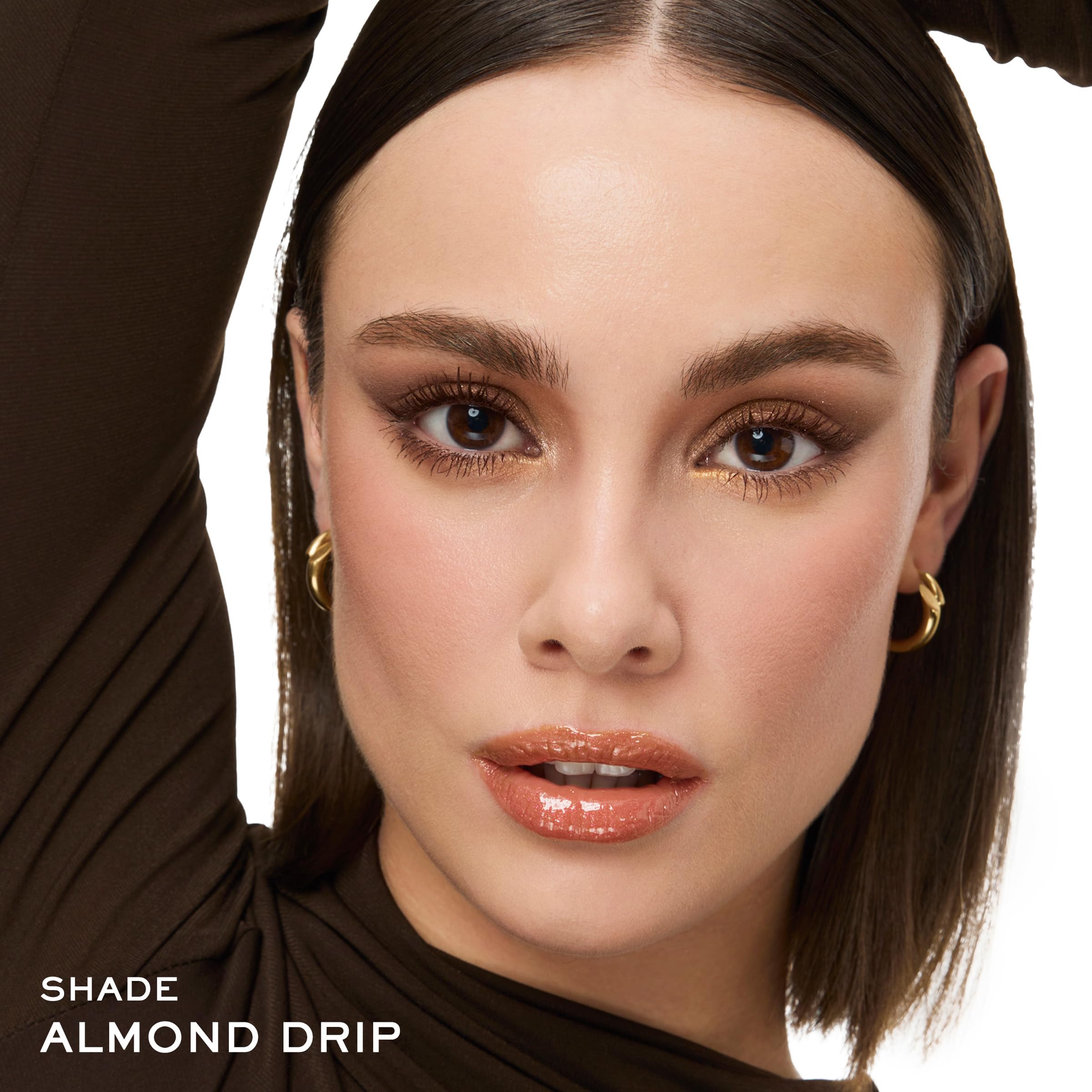 Lancôme Juicy Tubes on lips highlights hydration and cushiony feel.