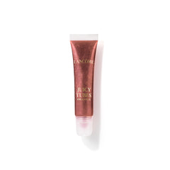 Lancôme Juicy Tubes gloss with ultra-shiny finish on a swatch for instant shine.