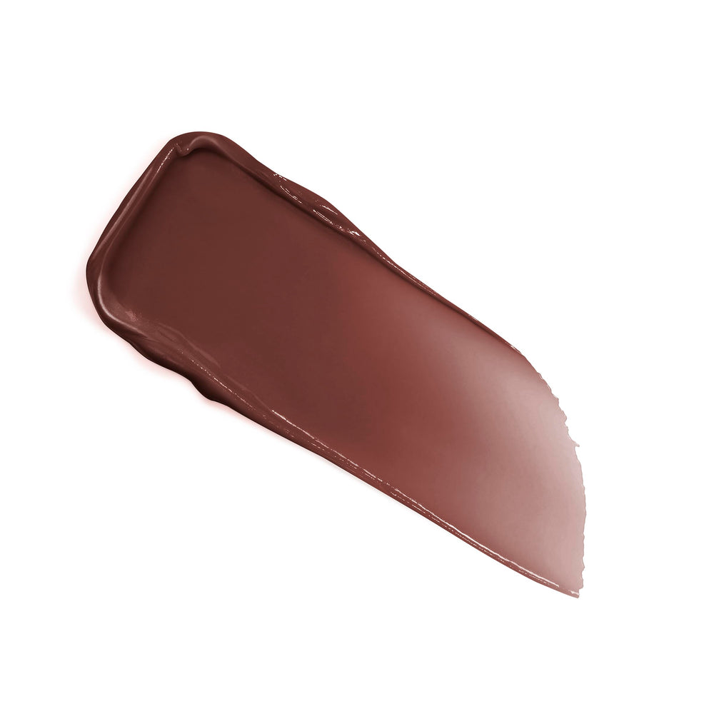 Lancôme Lip Idôle Butterglow balm emphasizes 24-hour hydration in supportive imagery.
