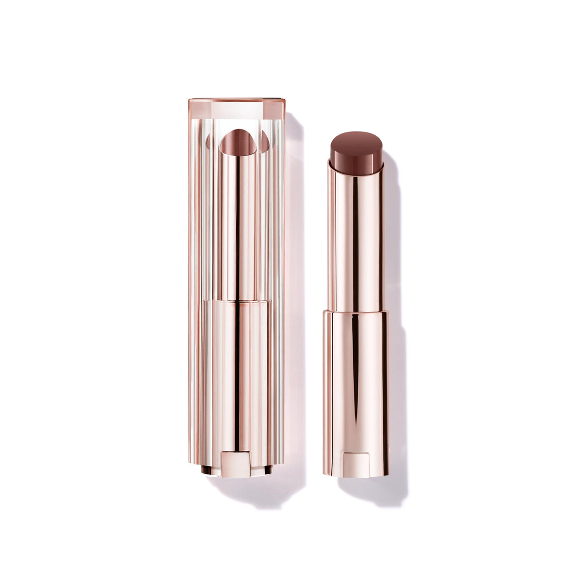 Lancôme Lip Idôle Butterglow balm packaging showcases premium branding for elegant lip care.