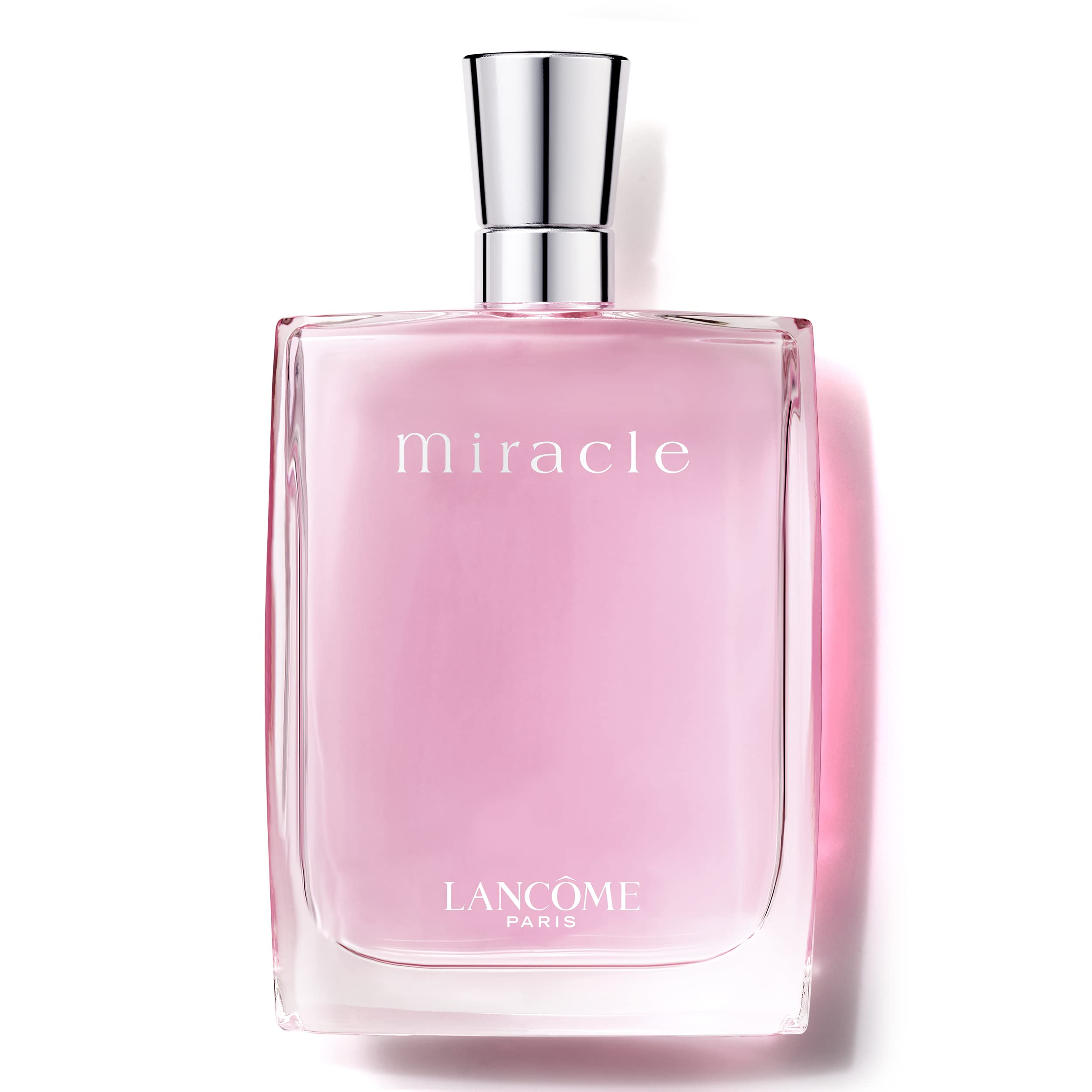 Lancôme Miracle EDP bottle glowing, suggesting a long-lasting floral-spicy fragrance.