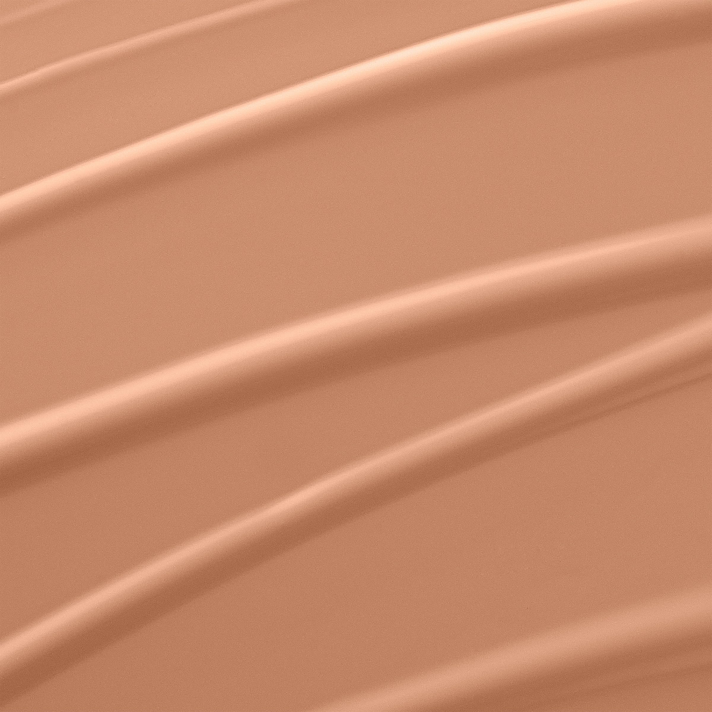 Lancôme Renergie Lift Foundation swatches on arm show medium-to-full coverage.