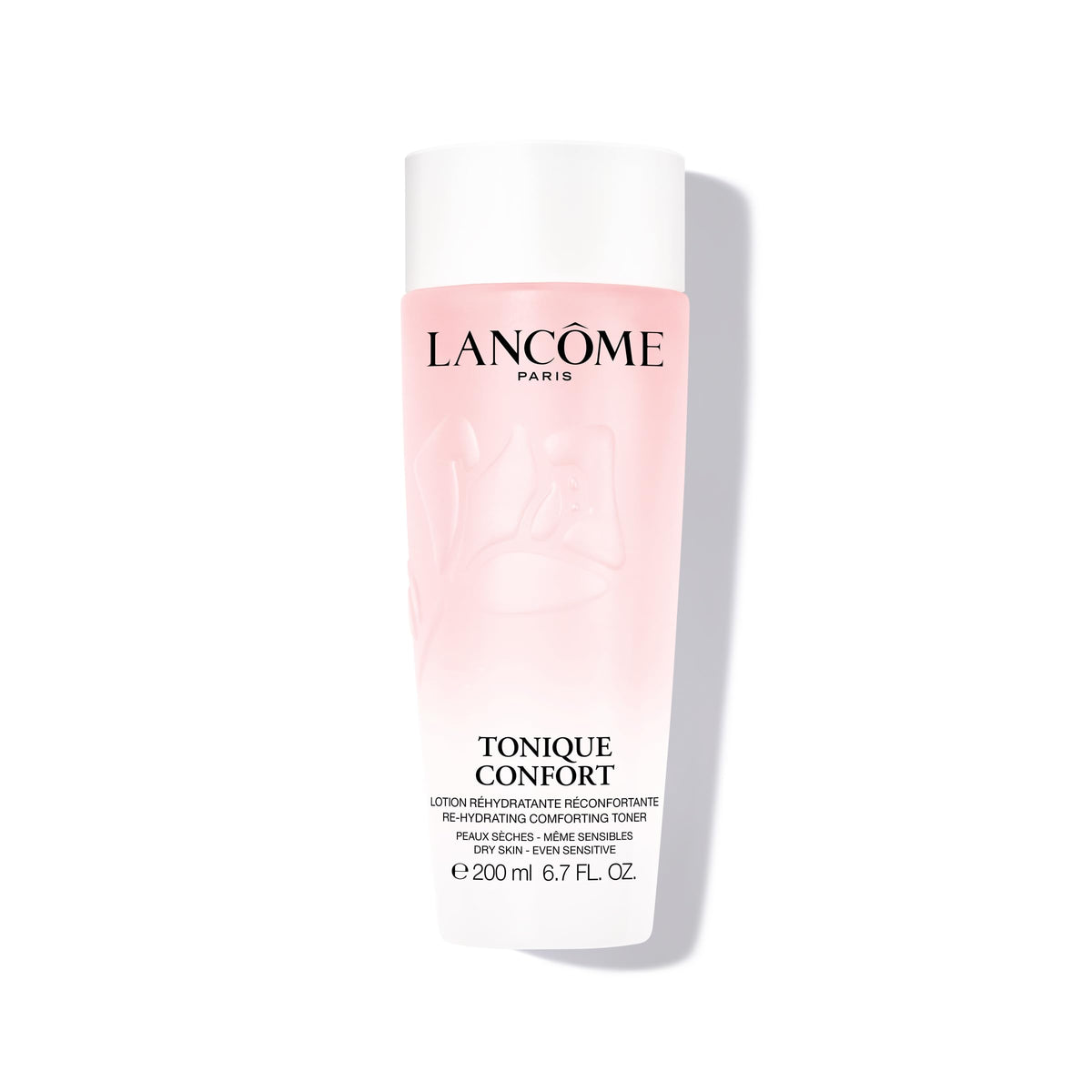 Lancôme Tonique Confort bottle close-up shows hydrating milky texture for daily comfort.