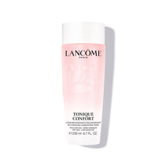 Lancôme Tonique Confort bottle close-up shows hydrating milky texture for daily comfort.