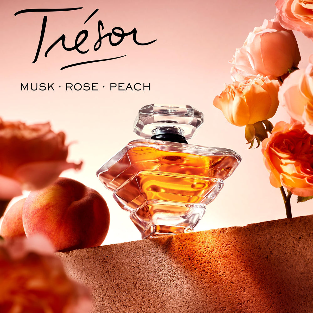 Lancôme Trésor floral notes of rose and apricot bloom invite refined, uplifting mood.