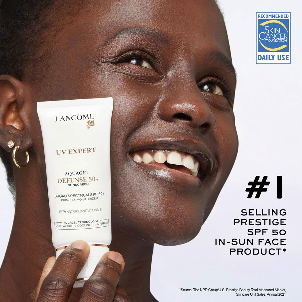 Lancôme UV Expert Defense packaging highlighting all-in-one primer, moisturizer, sunscreen benefits.