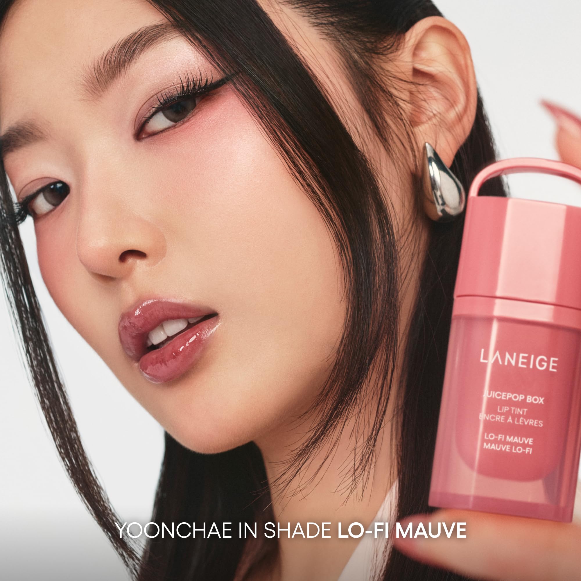 LANEIGE lifestyle image of tint clipped to keys for effortless on-the-go application