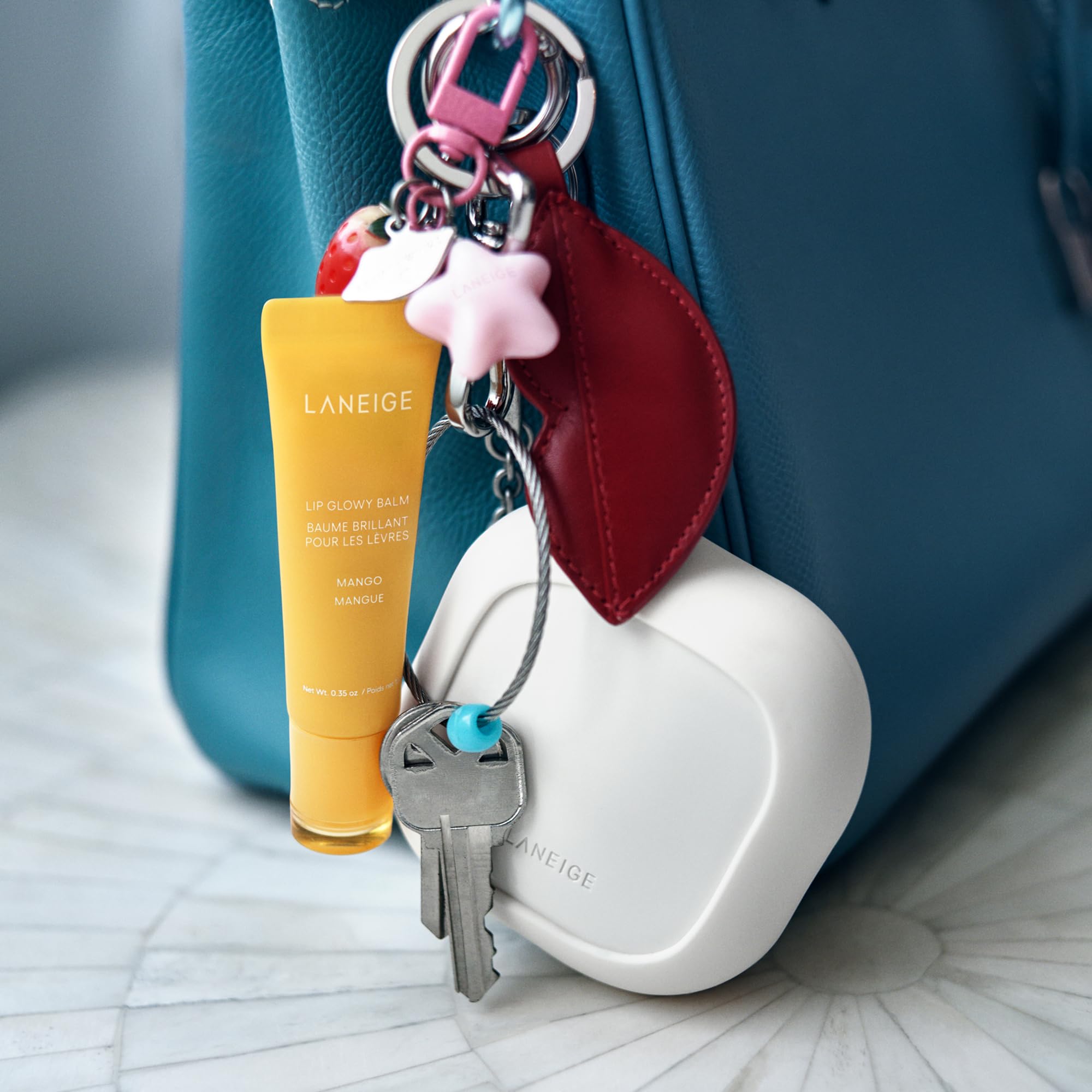LANEIGE polished silver ring detail emphasizing secure attachment and durability
