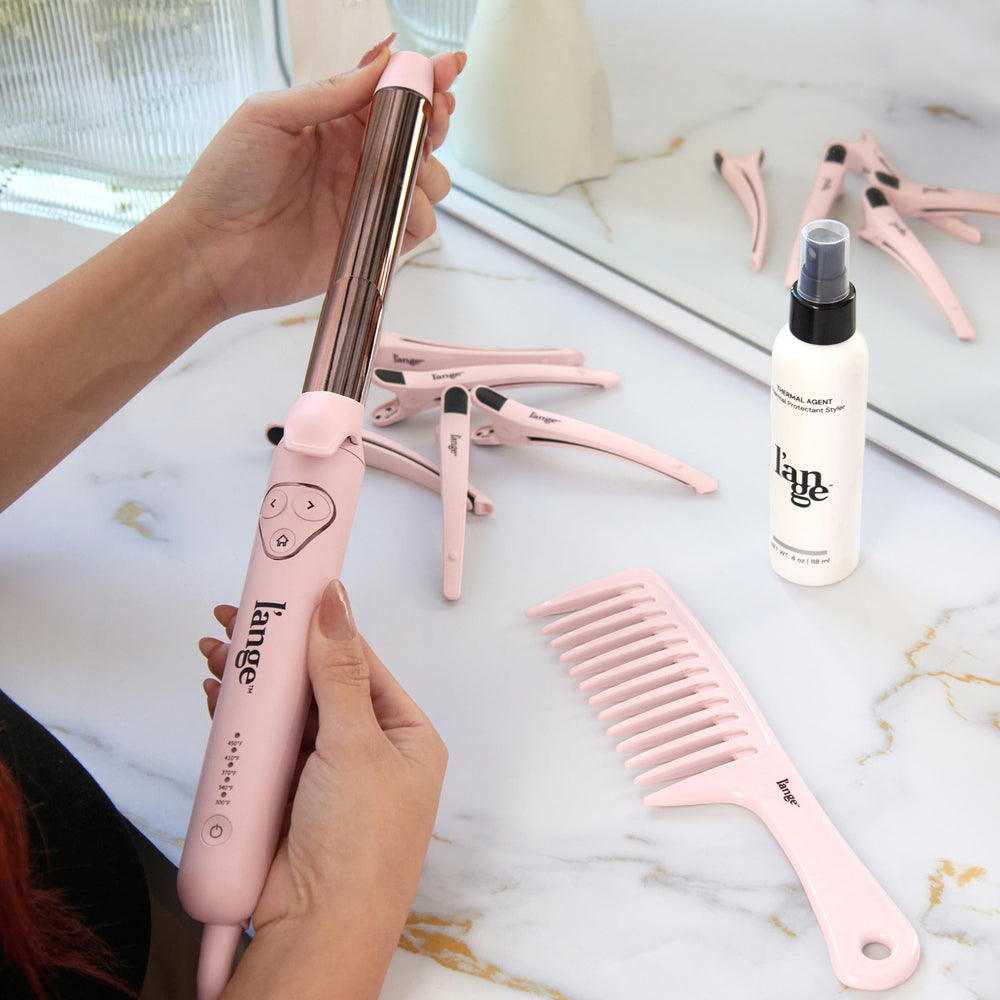 L'ANGE HAIR Le Pirouette in action capturing easy curling and smooth waves.