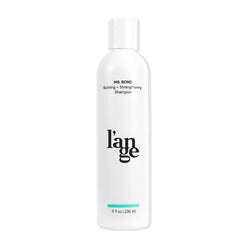 L'ANGE HAIR Ms. Bond Shampoo bottle front showing bond-building formula for stronger strands.