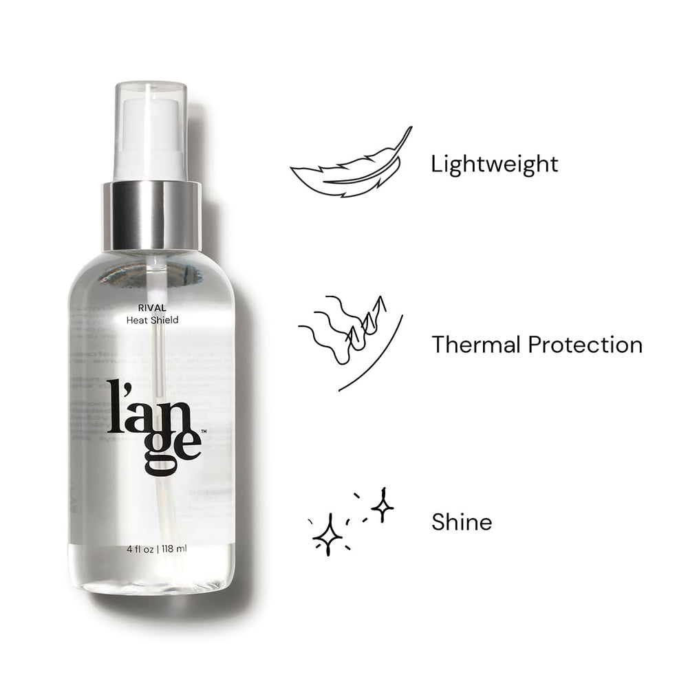 Close-up shows jojoba and safflower oils featured in Rival Heat Shield for hydration.