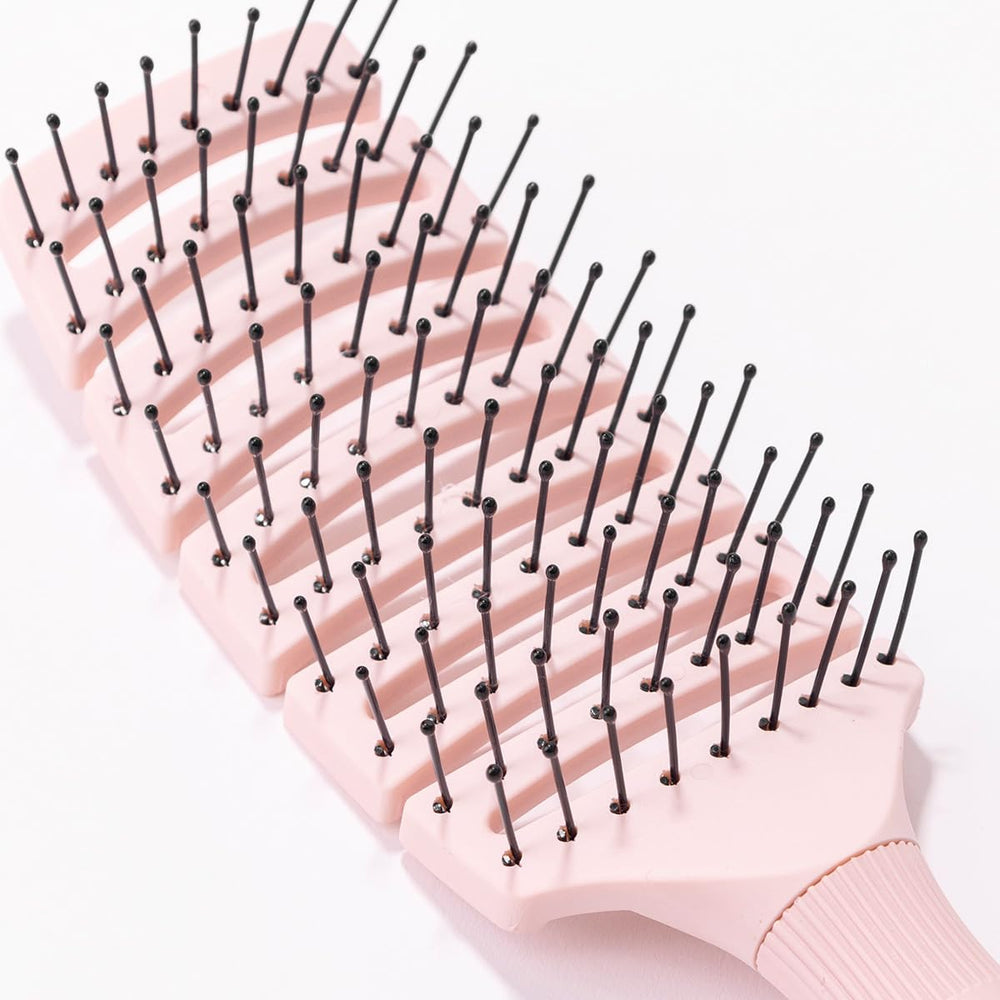 L'ANGE HAIR Siena brush during styling session showcases gentle scalp massage benefits.