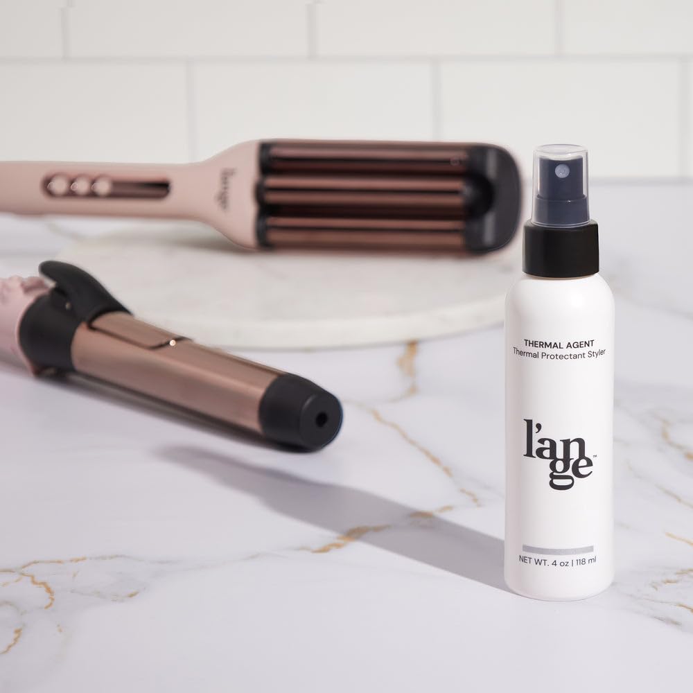 L'ANGE HAIR Non-greasy formula adds shine without weighing hair down.