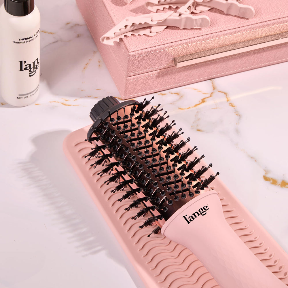 L'ANGE HAIR Le Volume cleaning brush keeps performance peak.
