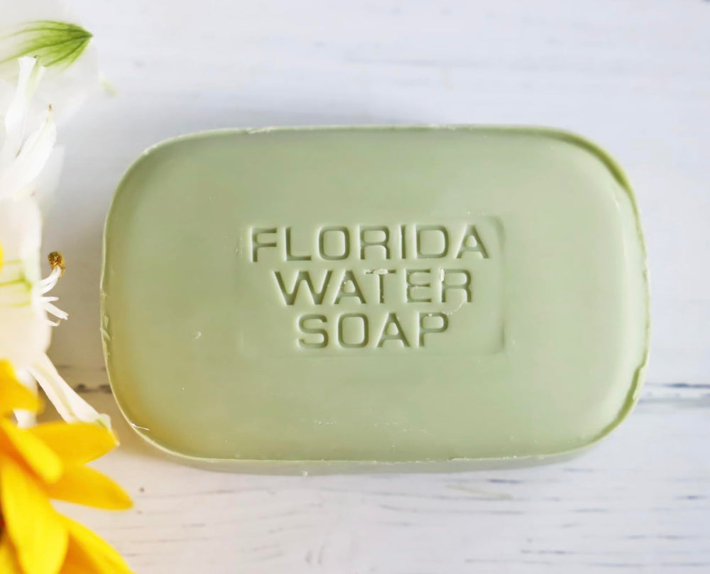 Lanman & Kemp Florida Water soap bar in hand showing rich lather and refreshing scent.