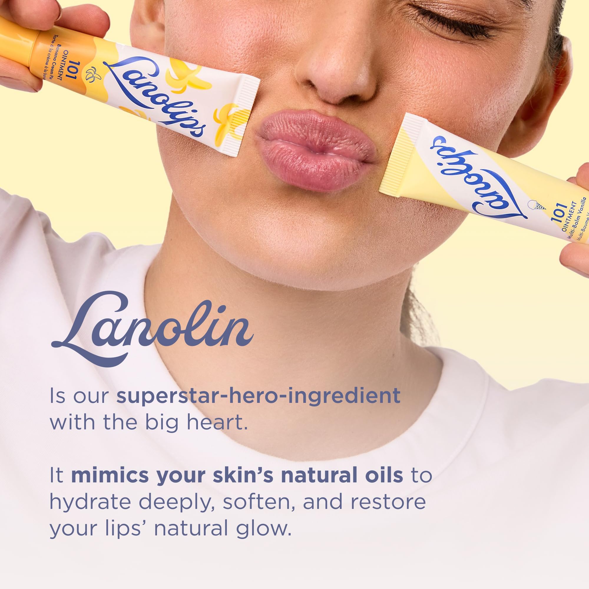 Model applying Lanolips 101 Ointment Raspberry Shortcake on lips for moisture.