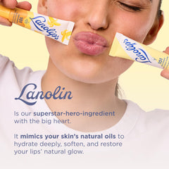 Model applying Lanolips 101 Ointment Raspberry Shortcake on lips for moisture.