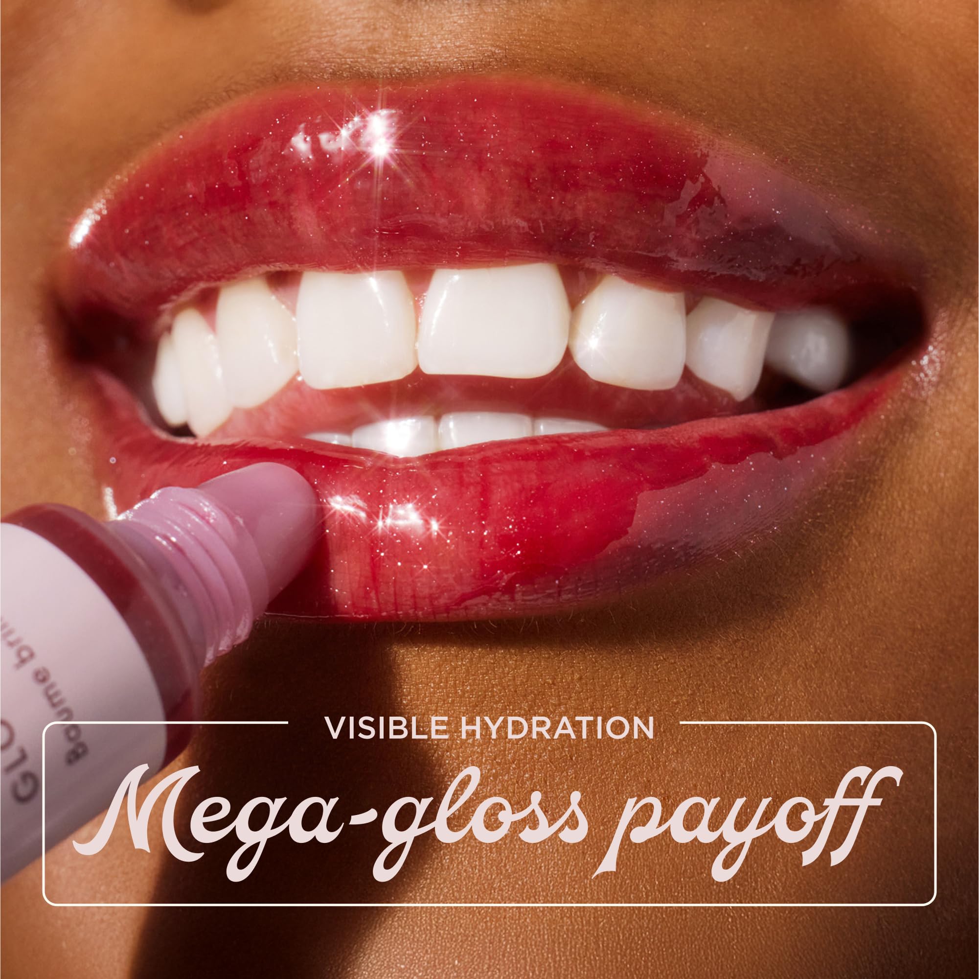 Lanolips Glossybalm Candy gold gloss highlights sparkle on lips.