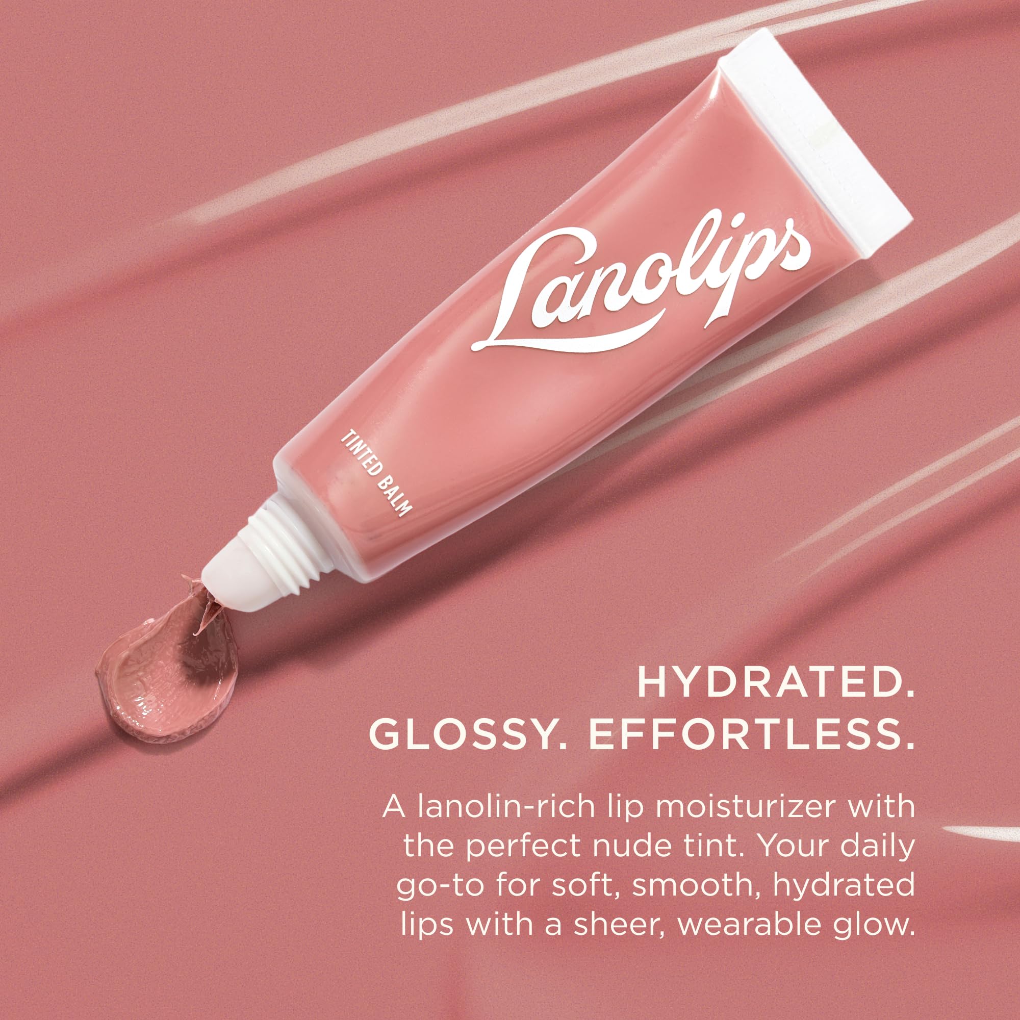 Lanolips Tinted Lip Balm application coats lips with creamy color.