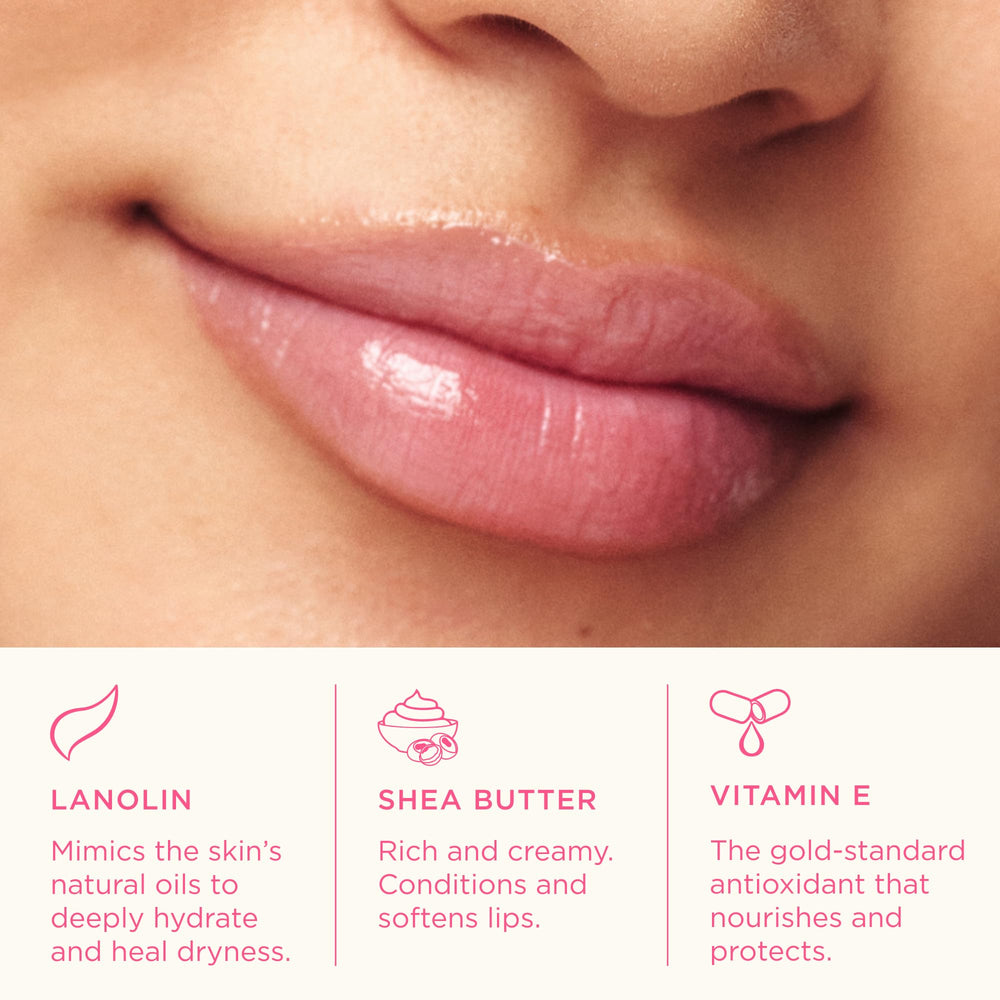 Lanolips Tinted Lip Balm Rhubarb on lips offers natural, hydrated color.