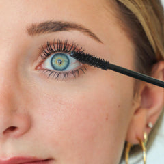 Lash Next Door mascara brush closeup—clump-free, smooth application.