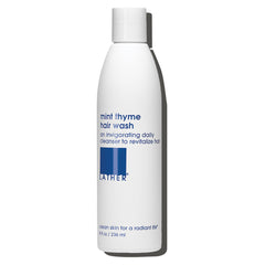 LATHER Mint Thyme Hair Wash bottle pour for a refreshing daily cleanse
