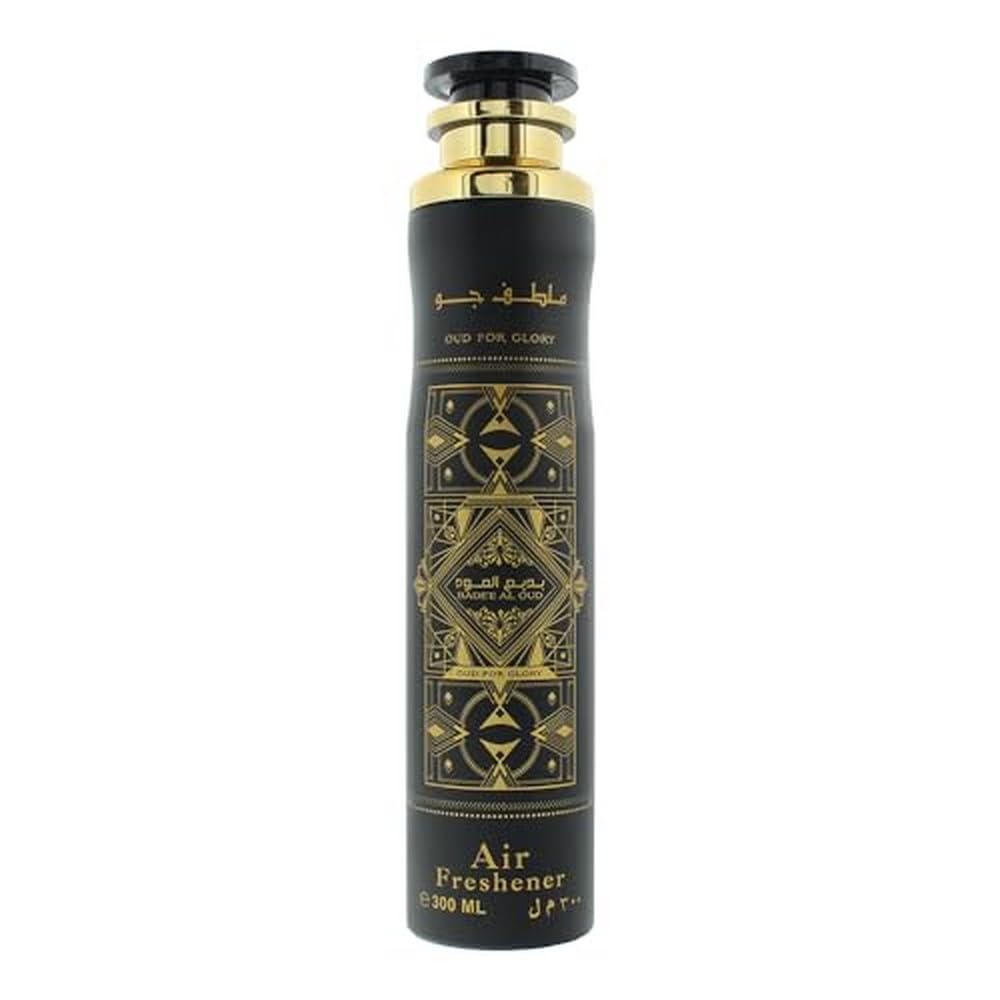 Lattafa Badee Al Oud Oud For Glory air freshener bottle close-up highlights citrus-oud aroma for a fresh ambiance