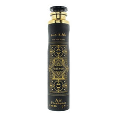 Lattafa Badee Al Oud Oud For Glory air freshener bottle close-up highlights citrus-oud aroma for a fresh ambiance