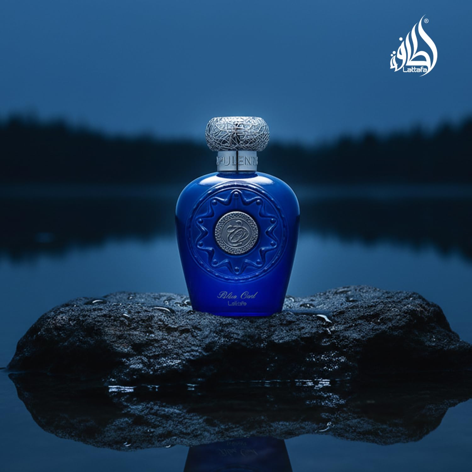 Lattafa Blue Oud amber-wood tones highlight warm resinous atmosphere.