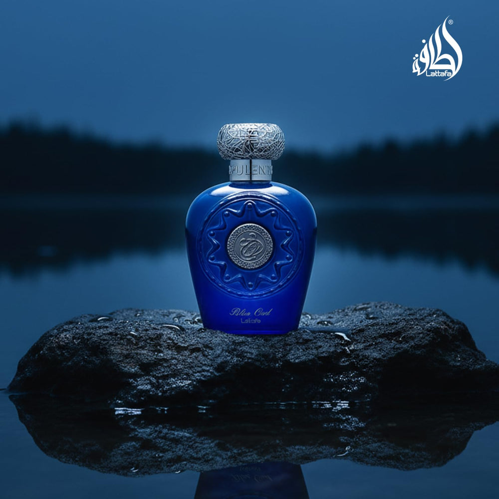 Lattafa Blue Oud amber-wood tones highlight warm resinous atmosphere.