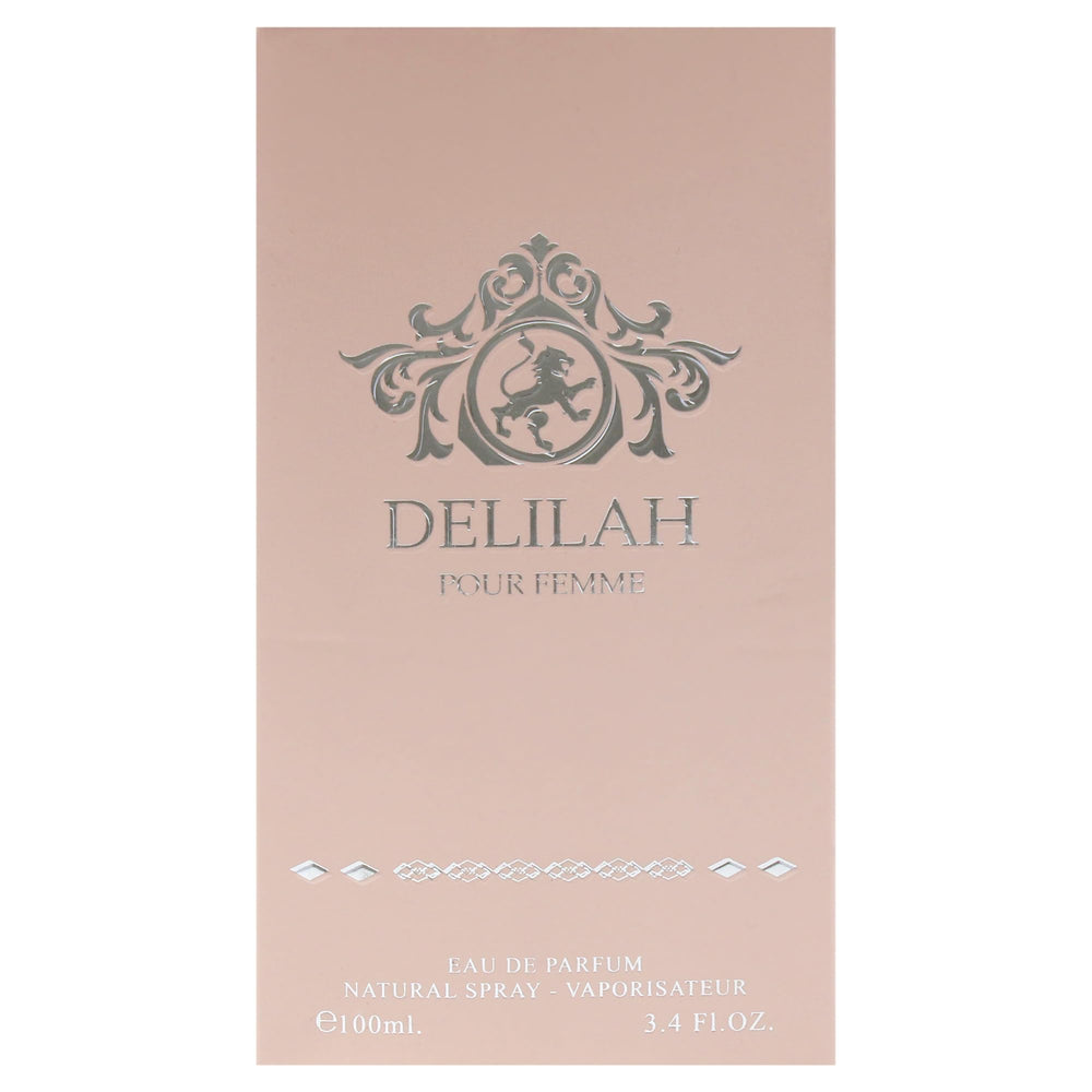 Lattafa Delilah bottle in a dark backdrop, evening wear inspiration.