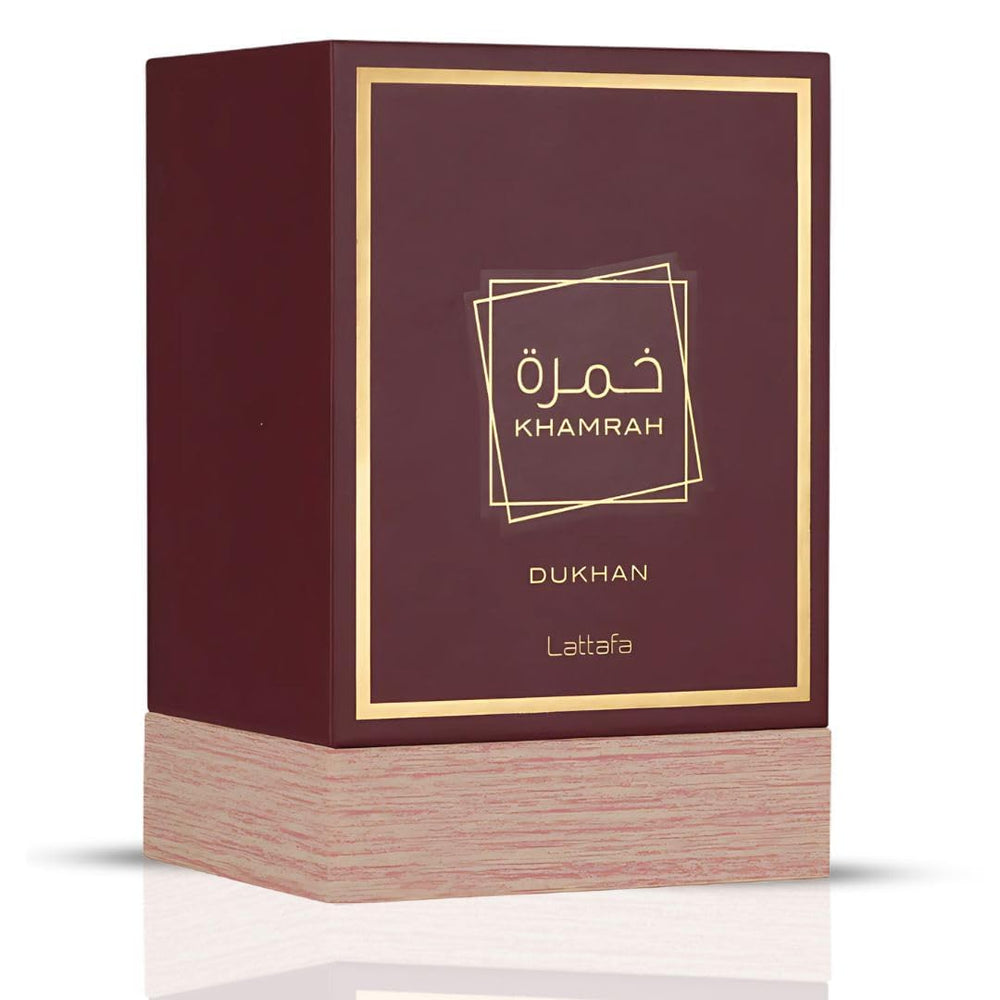 Lattafa Khamrah Dukhan spray bottle ready for on-the-go scent experiences.
