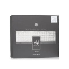 Lattafa Liam Grey spray on wrist, convenient for on-the-go fragrance refresh.