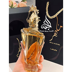 Lattafa Maahir peach-bellini top-note image evokes summery zest and social confidence.
