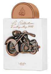 Lattafa Pride 1910 packaging close-up, highlighting the lasting gourmand-woody notes.