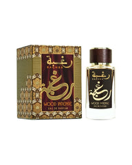 Lattafa Raghba Wood Intense bottle front for bold evening wear