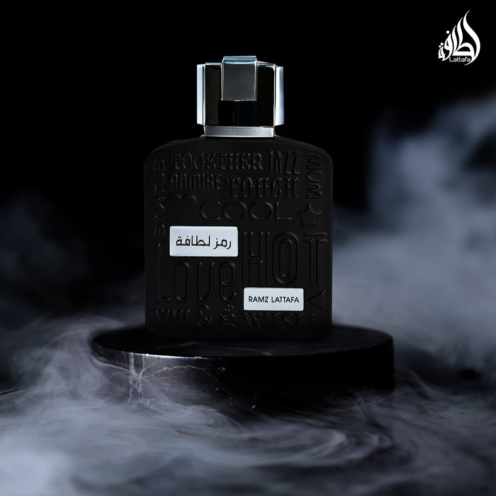 Lattafa Ramz Silver box packaging showcases gift-worthy design and luxurious vanilla amber.