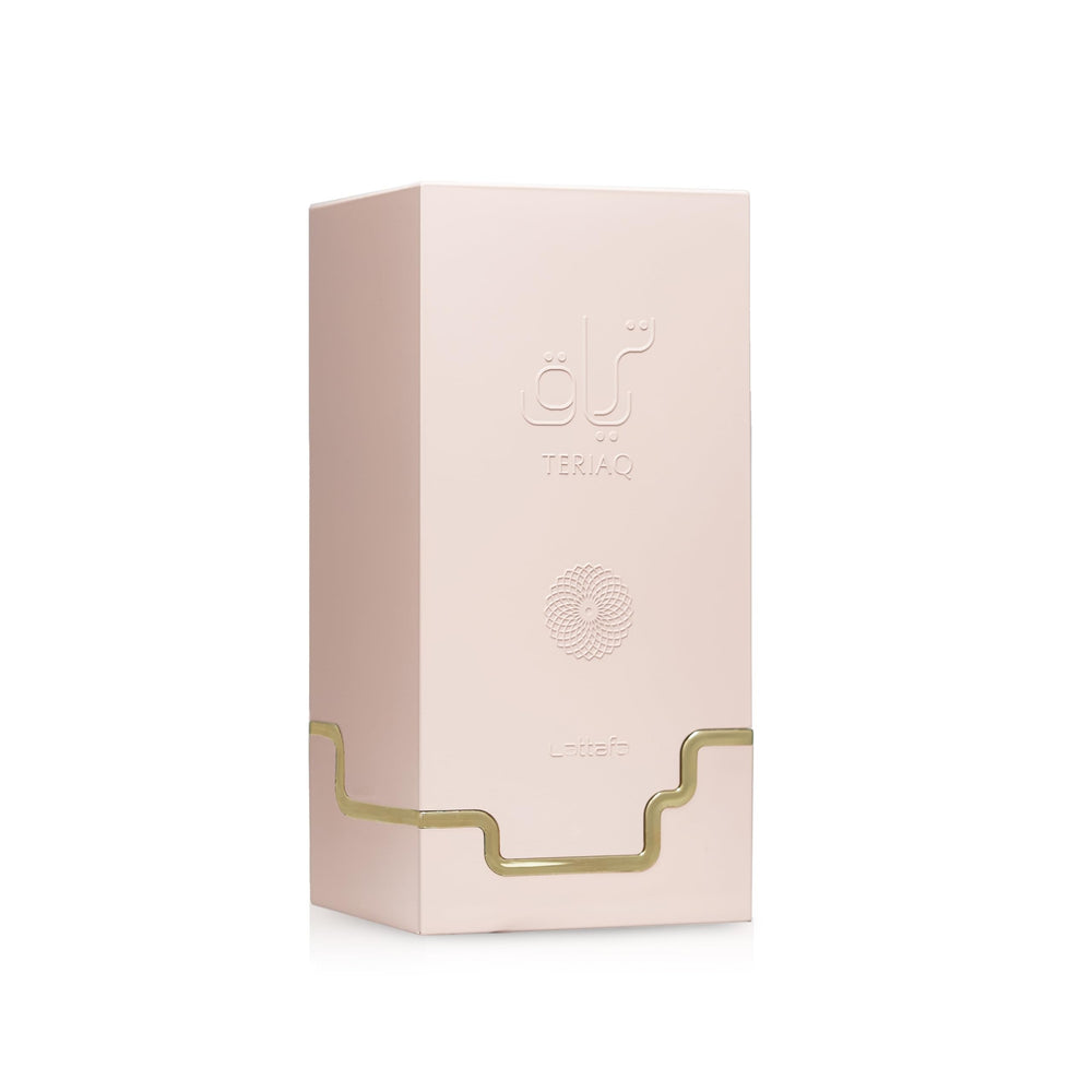 Lattafa Teriaq 3.4 oz bottle on wood for refined styling.